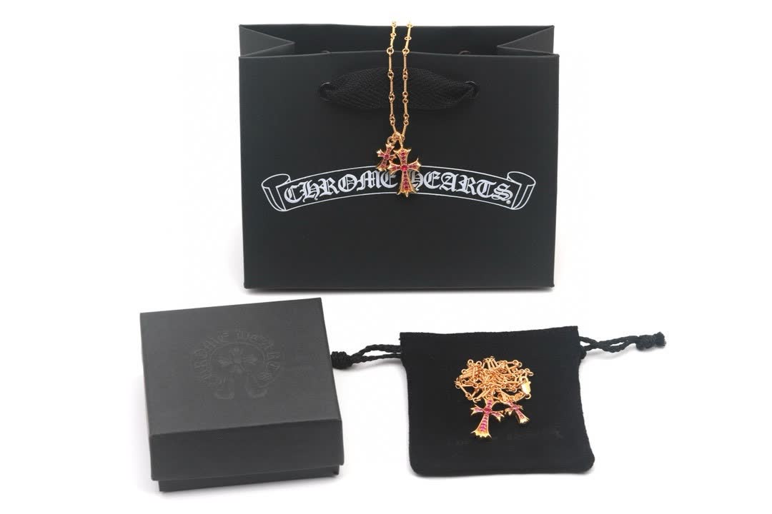 Chrome Hearts Gold Cross Pendant with Pink Stones